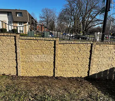 A decorative stone wall in a Clive, Iowa, neighborhood.