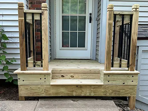 A fenced-in wooden staircase.